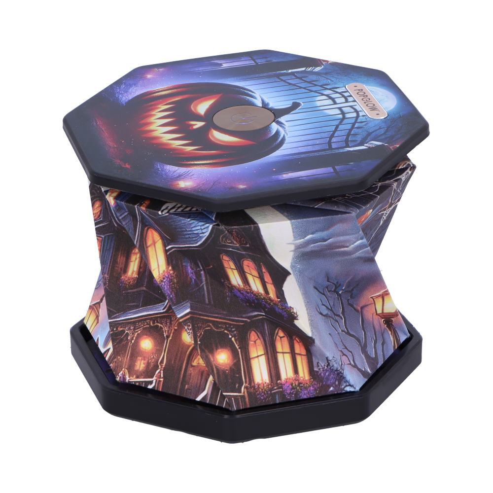 Hexagonal collapsible stool with Halloween haunted-house artwork on sides and a pumpkin face lid, used for seating or storage.