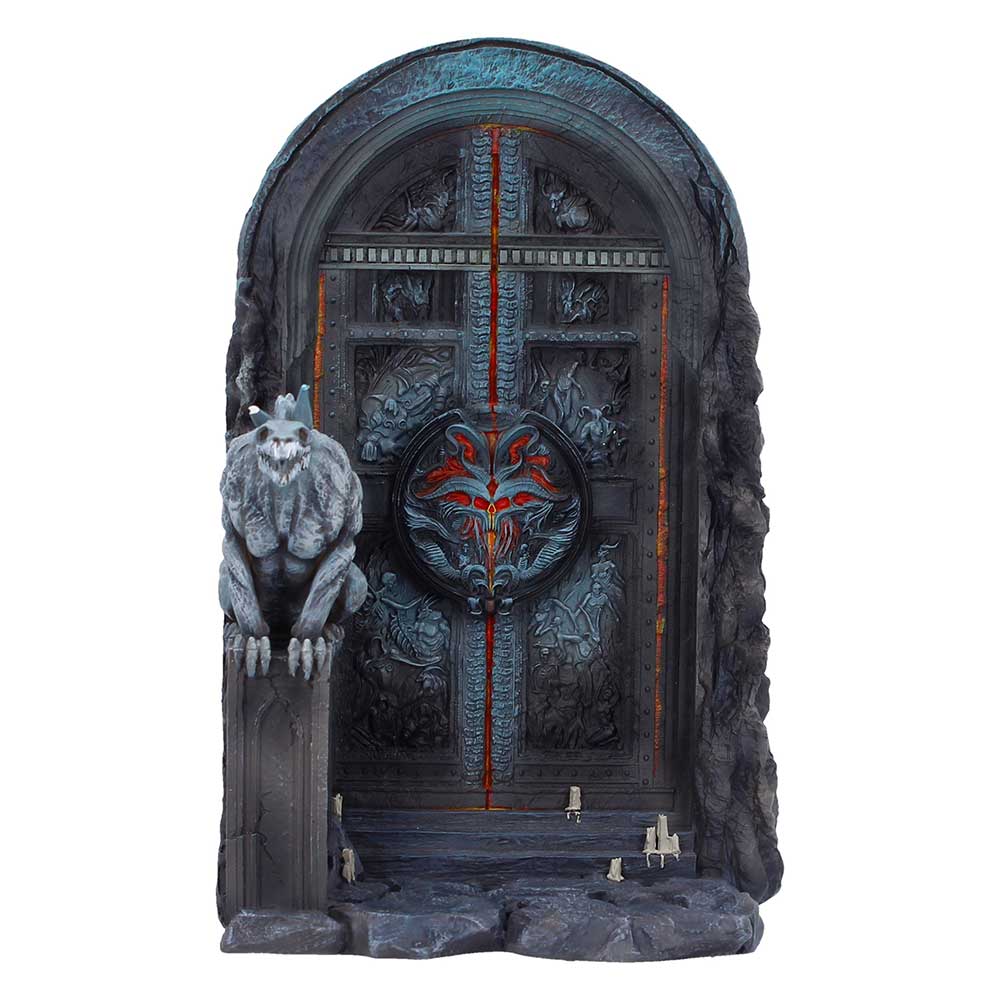 Fantasy dungeon entrance: a stone arch with an ornate metal door, guarded by a gray gargoyle statue on a pedestal to the left. A red vertical line runs down the door, with a demon-emblem centerpiece and scattered candles at the doorstep.