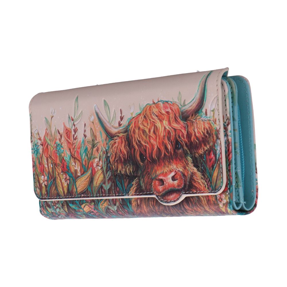Beige wallet with a colorful Highland cow illustration amid tall plants and a teal interior edge, closed style (informative product image).