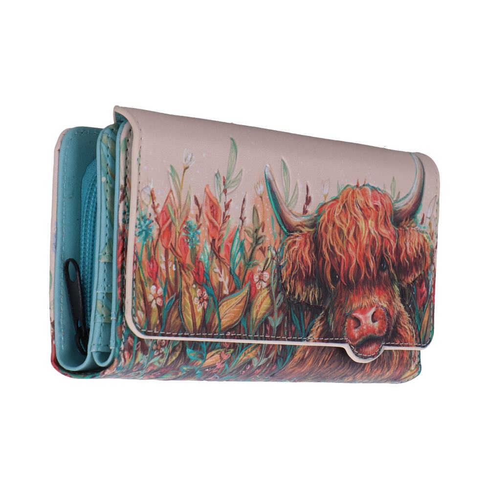 Colorful bi-fold wallet featuring a painted Highland cow among tall grasses, with a pink exterior and turquoise interior.