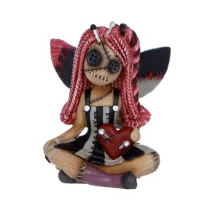 Zombie fairy plush figure with pink yarn hair, striped dress, wings, sitting cross‑legged and holding a red heart