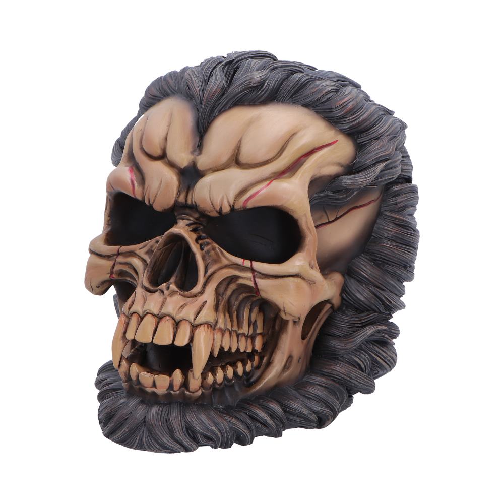Decorative skull mask with long dark hair and red veins, a Halloween prop.