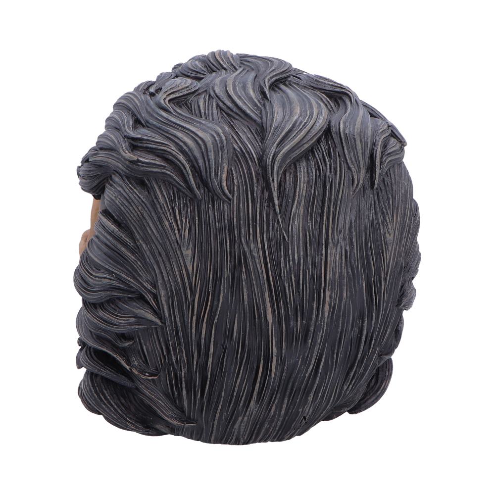 Dark gray hair styling clay ball with ridged, wavy surface