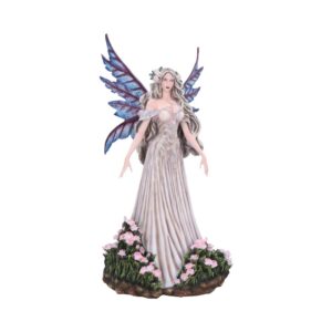 Elegant fairy statue with flowing gown and blue wings standing on a flower-covered base.