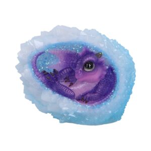 Purple baby dragon curled up inside a light-blue crystal egg, with sparkly glitter.