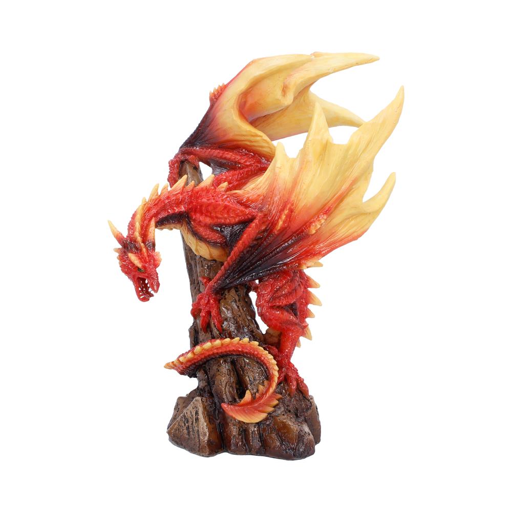 Red and orange dragon figurine perched on a rocky pedestal with fiery wings extending behind it in a dynamic pose, decorative statue for display.