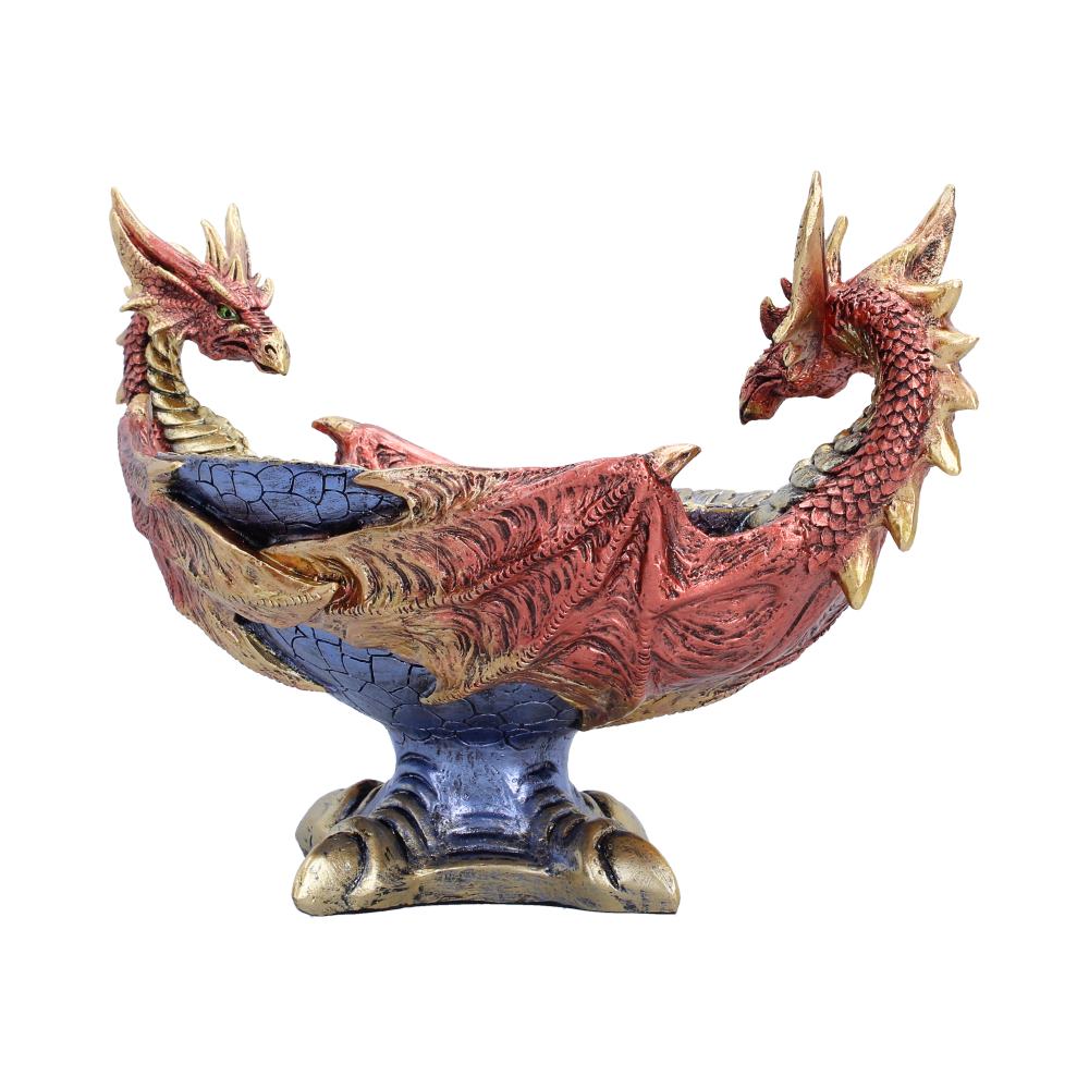 Decorative double-headed dragon statue in red with gold accents on a blue pedestal.