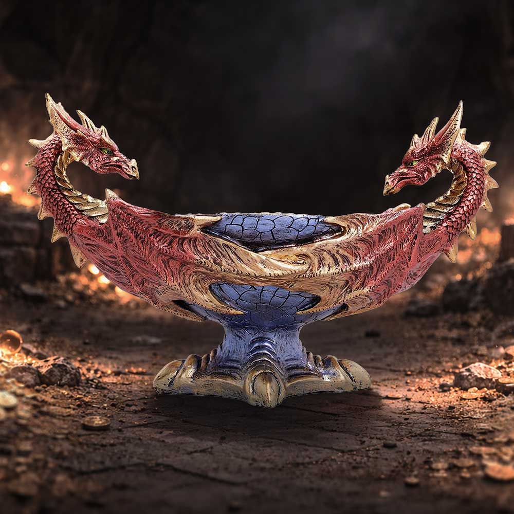 Decorative double‑headed dragon bowl with red and blue scales, set on a pedestal in a dark, dungeon-like scene